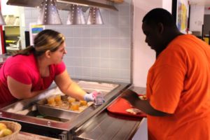 Photo of CCR students working in the kitchen